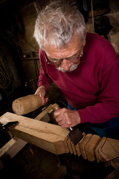 woodcarver using a wood clamp